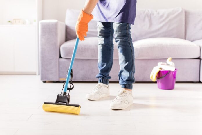portrait-man-cleaning-his-house-1024x683